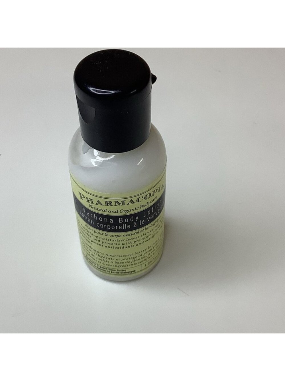 PHARMACOPIA VERBENA BODY 1 oz LOTION BOTTLE, TRAVEL/HOTEL SIZE